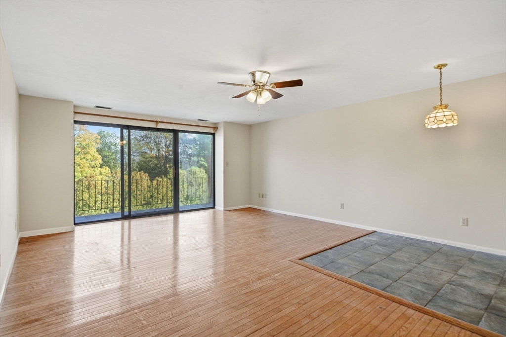 30 Conant Street, Unit 3B Beverly, MA 01915 - Photo 8 of 30 wooden floor in an empty room with a window