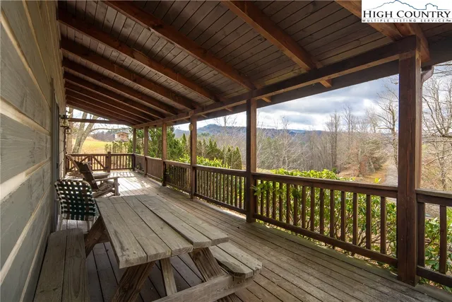 a view of balcony with wooden floor