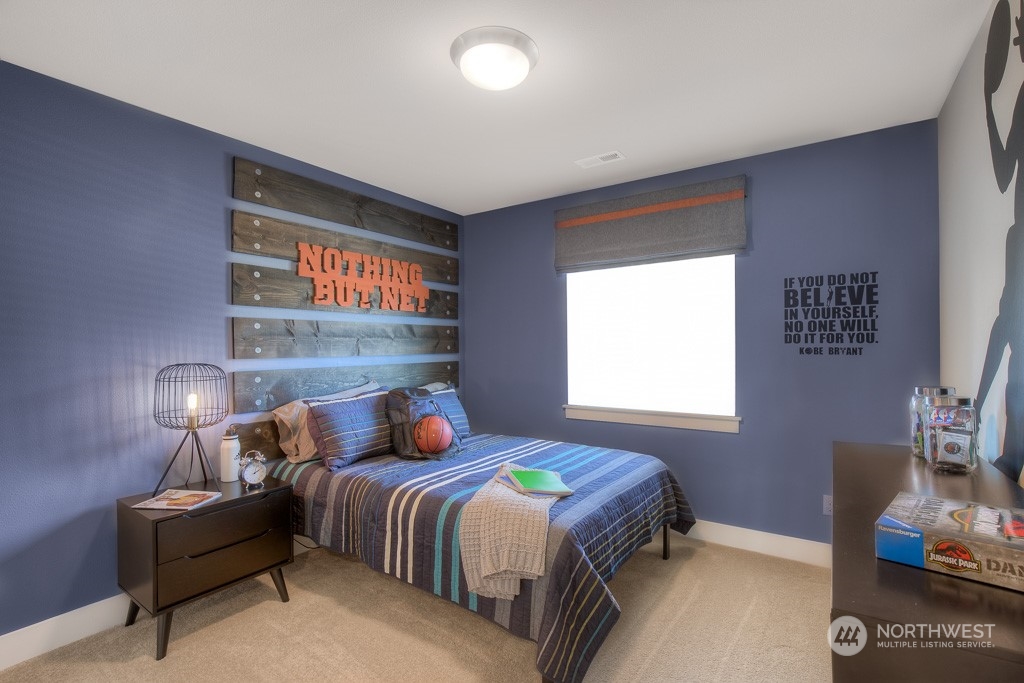 2011 228th Place Southwest Bothell, WA 98021 - Photo 17 of 20 a bedroom with a bed and window