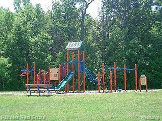 4269 Hampton Ridge Boulevard, Unit 139 Howell, MI 48843 - Photo 11 of 13 playground.jpg