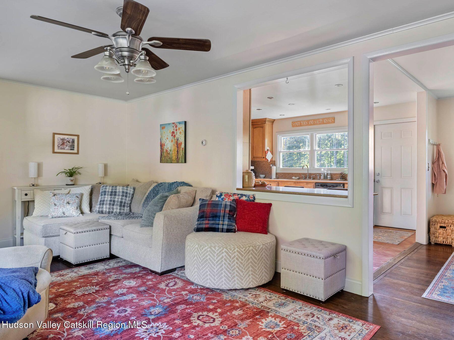 29 Hapeman Hill Road Red Hook, NY 12571 - Photo 17 of 63 a living room with furniture and a large window