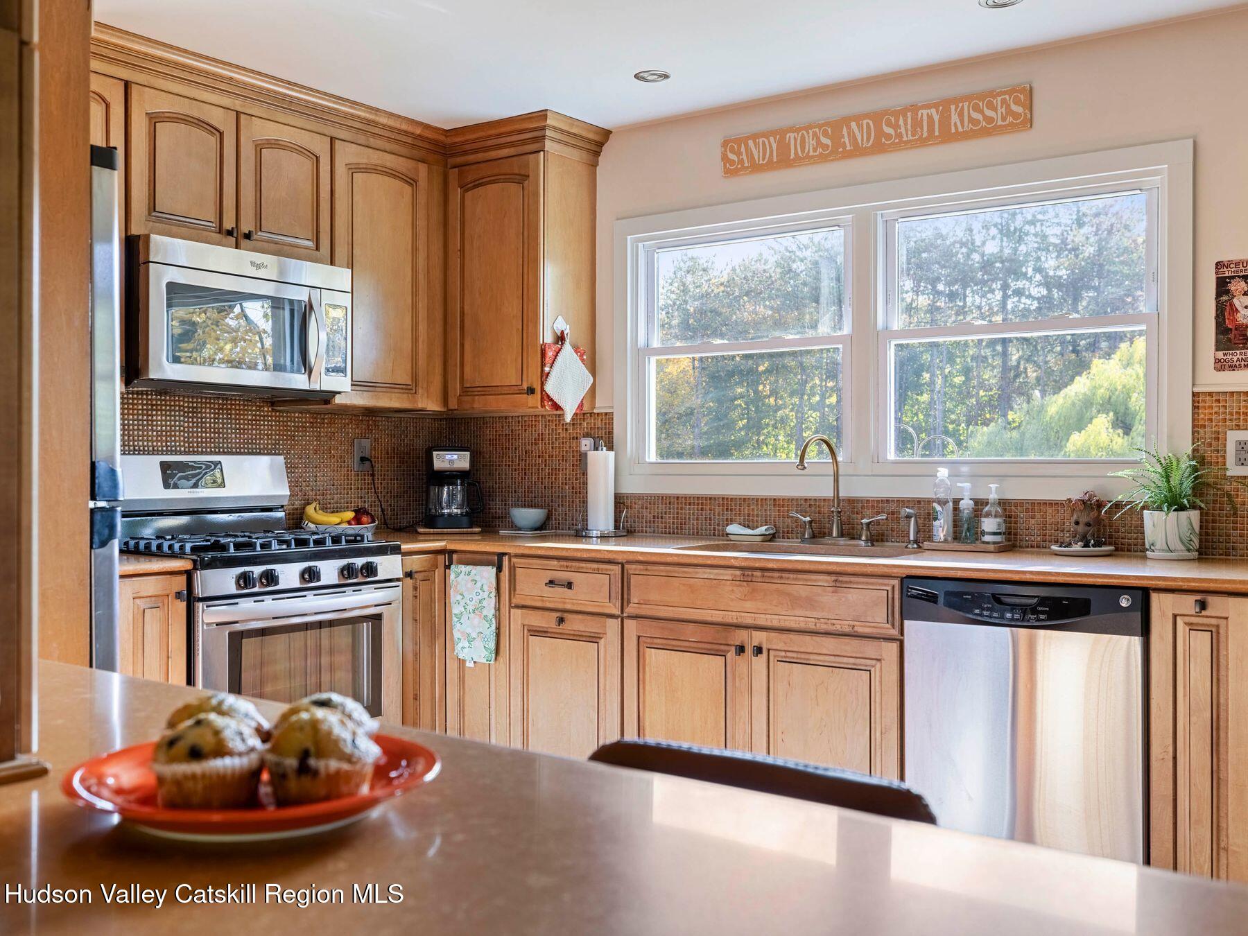 29 Hapeman Hill Road Red Hook, NY 12571 - Photo 18 of 63 a kitchen with stainless steel appliances granite countertop a stove and a sink