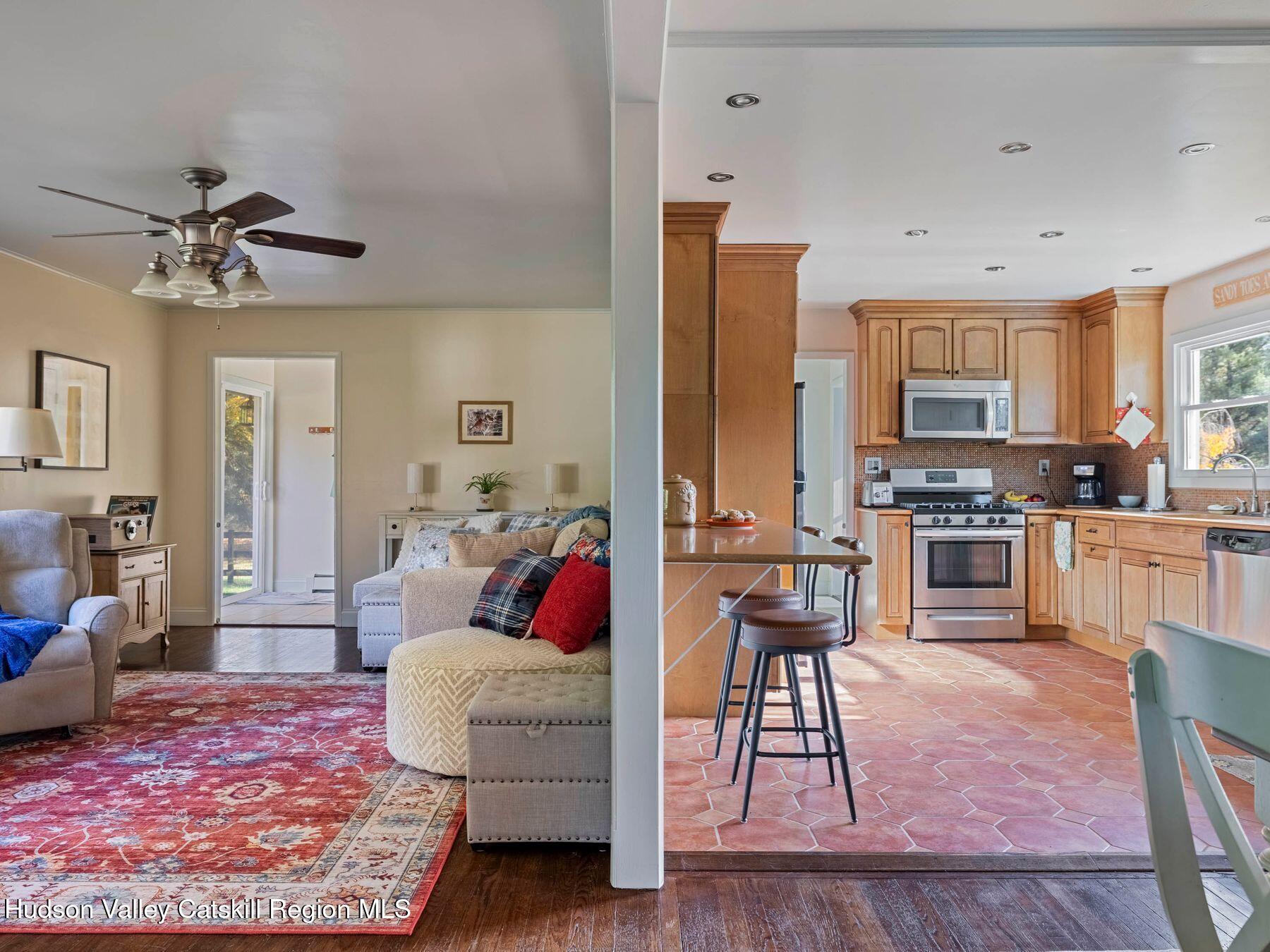 29 Hapeman Hill Road Red Hook, NY 12571 - Photo 23 of 63 a living room with furniture and a kitchen