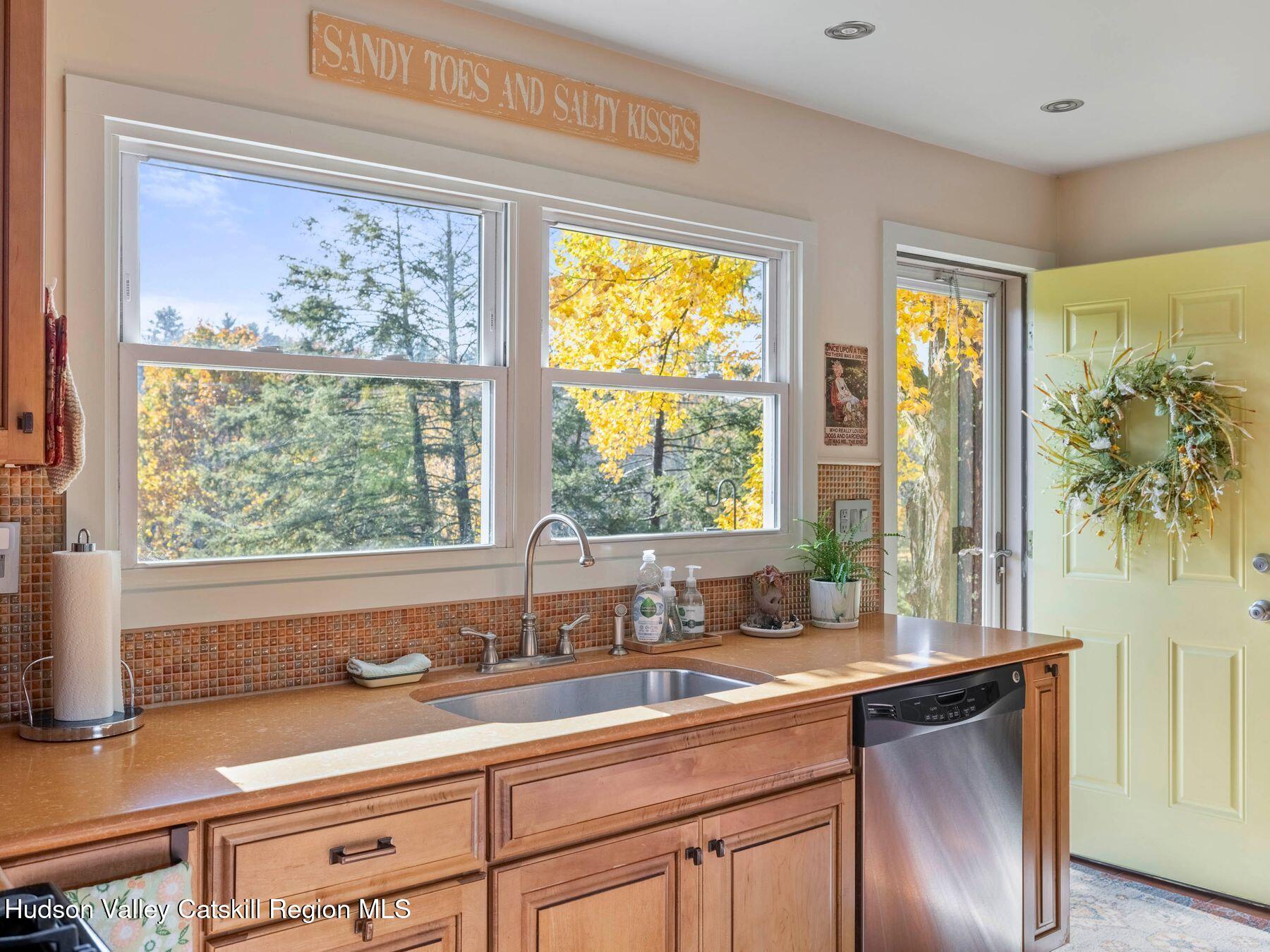 29 Hapeman Hill Road Red Hook, NY 12571 - Photo 27 of 63 a sink with a large window and wooden floor