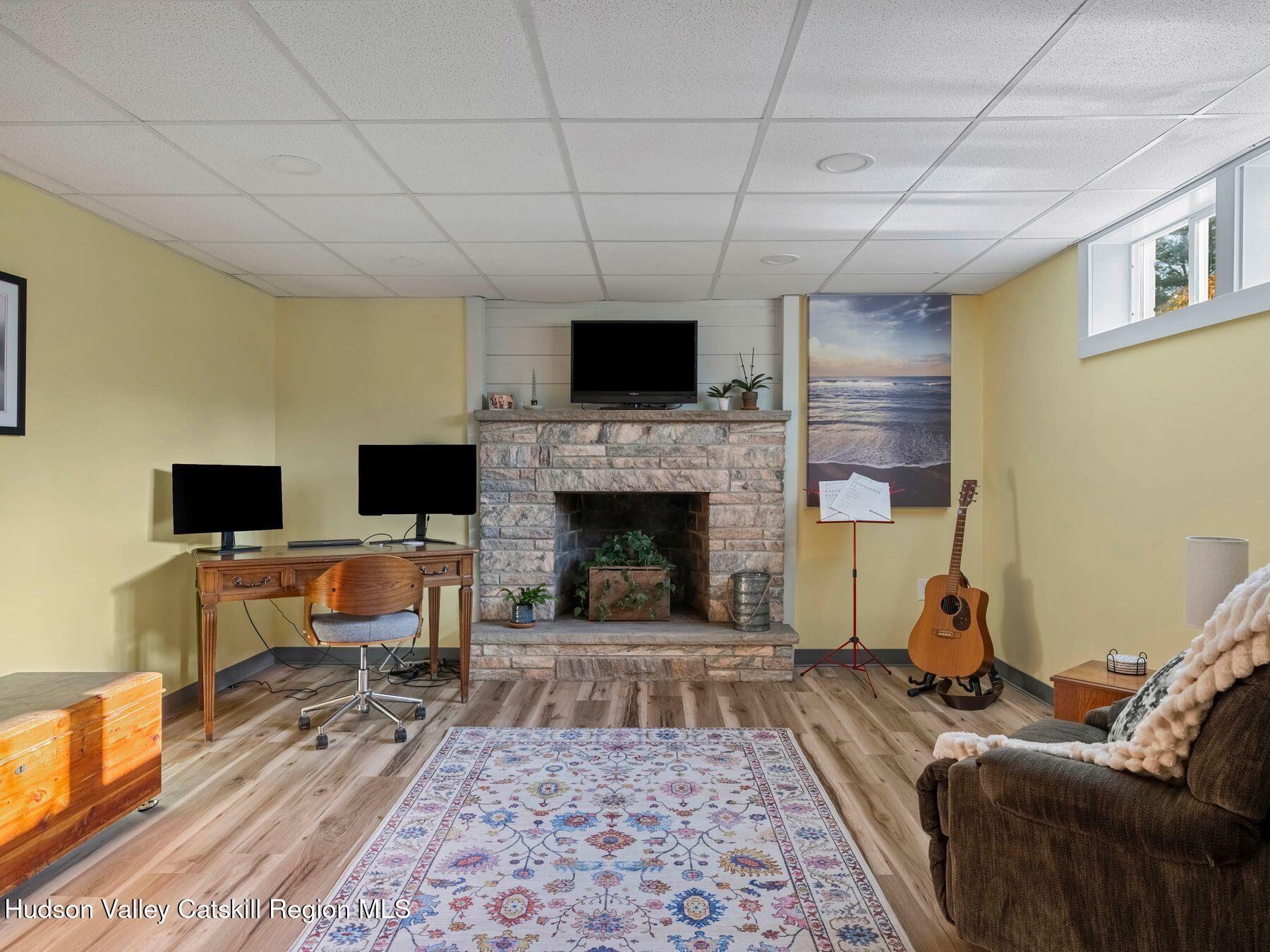 29 Hapeman Hill Road Red Hook, NY 12571 - Photo 46 of 63 a living room with furniture and a fireplace