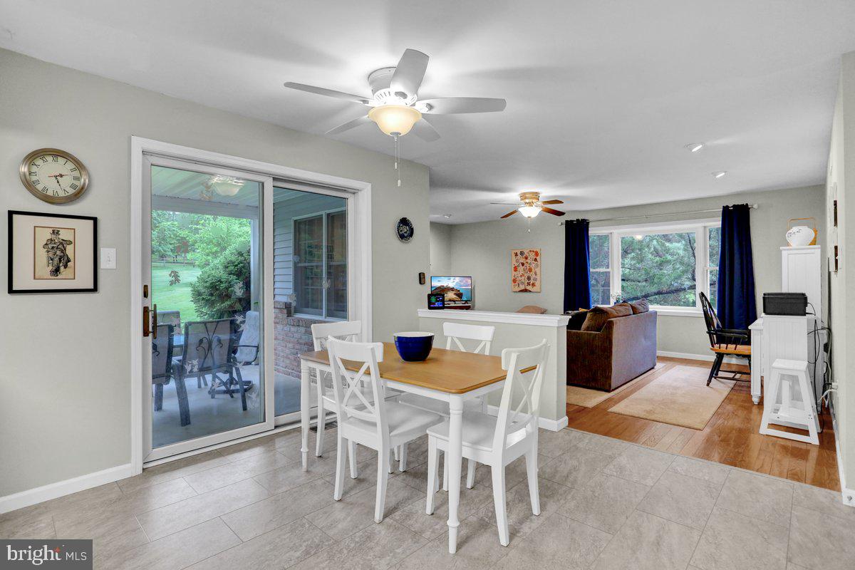 198 Bard Road Pottstown, PA 19465 - Photo 14 of 64 Kitchen table, view to patio and family room
