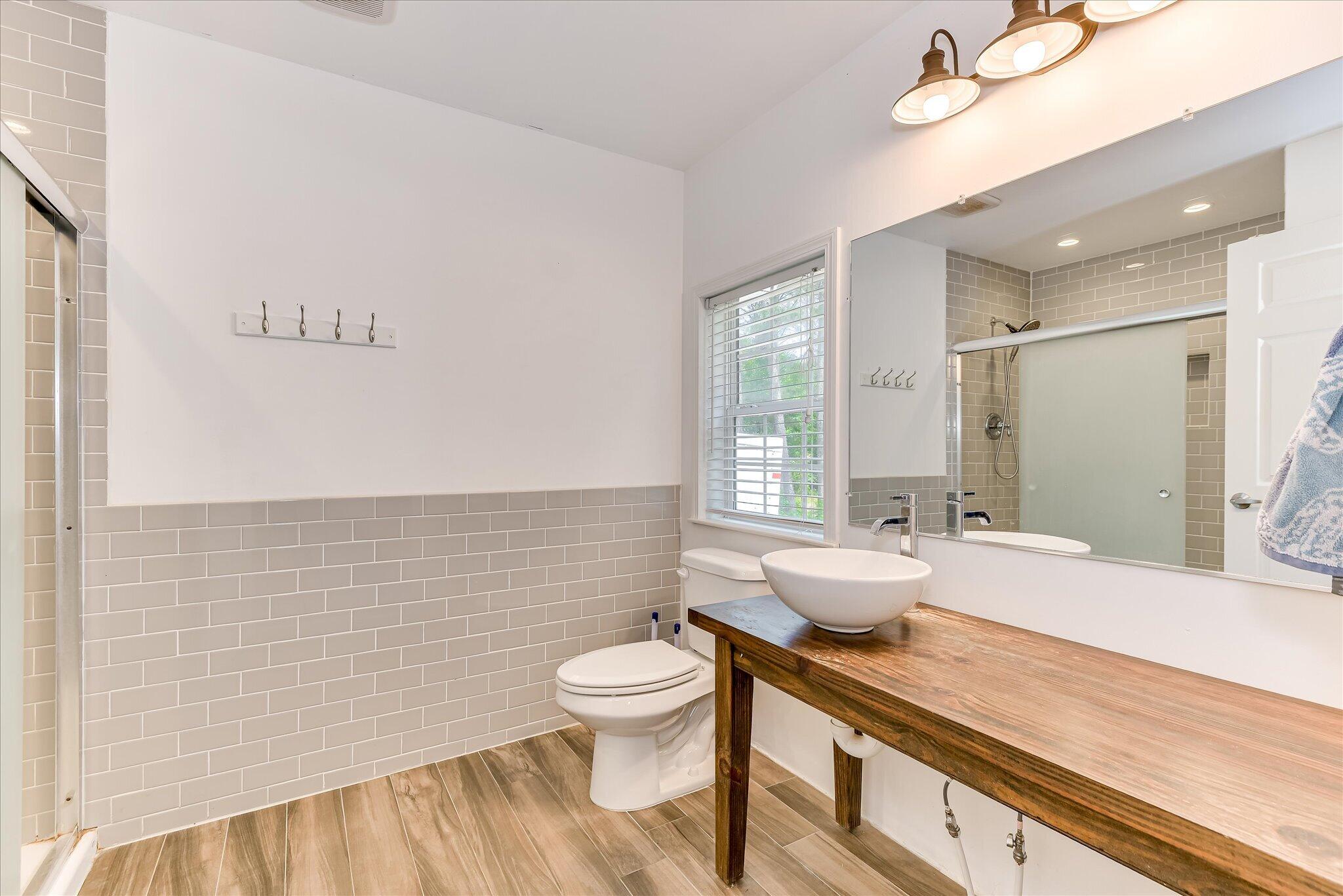 1405 Garrett Road Clarks Hill, SC 29821 - Photo 26 of 51 a bathroom with a sink a toilet and shower