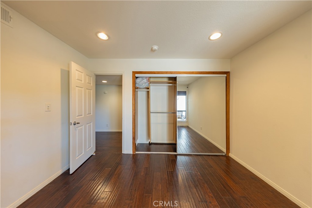 6242 Riviera Circle Long Beach, CA 90815 - Photo 13 of 29 a view of wooden floor in an empty room