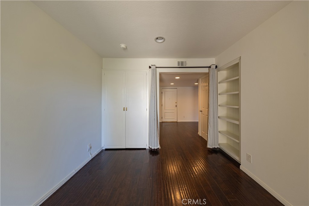6242 Riviera Circle Long Beach, CA 90815 - Photo 18 of 29 a view of empty room with wooden floor