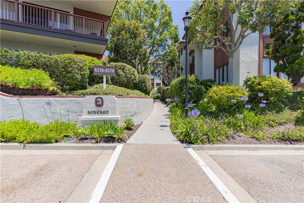 6242 Riviera Circle Long Beach, CA 90815 - Photo 27 of 29 a view of a garden with pathway