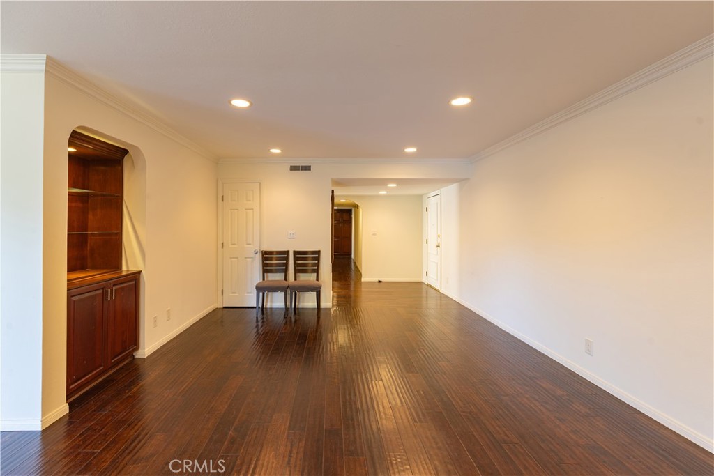 6242 Riviera Circle Long Beach, CA 90815 - Photo 4 of 29 a view of empty room with wooden floor