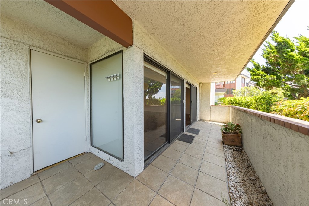 6242 Riviera Circle Long Beach, CA 90815 - Photo 9 of 29 a view of hallway with stairs
