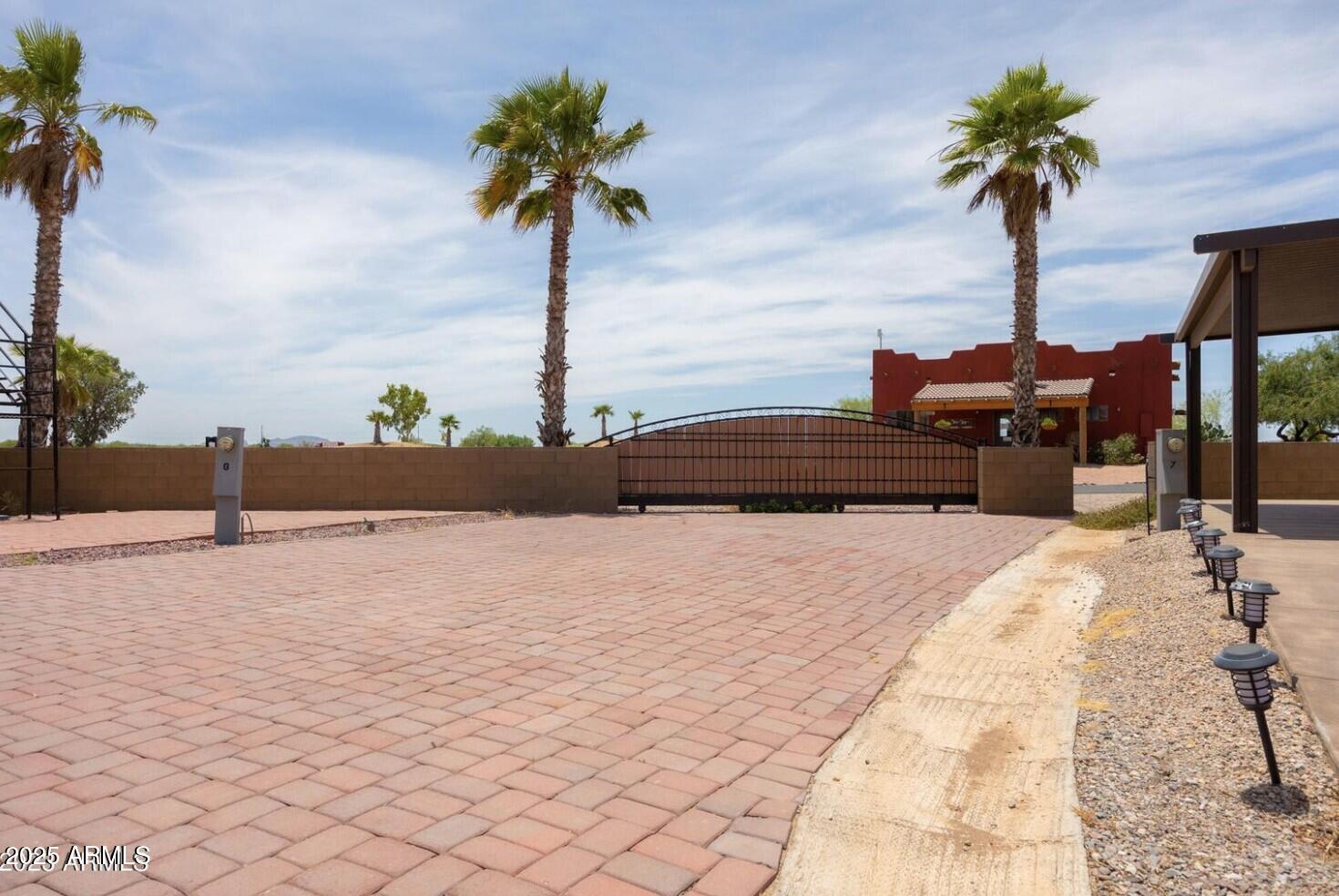 3290 South Montgomery Road, Unit 6 Casa Grande, AZ 85193 - Photo 4 of 8 a street view with potted plants