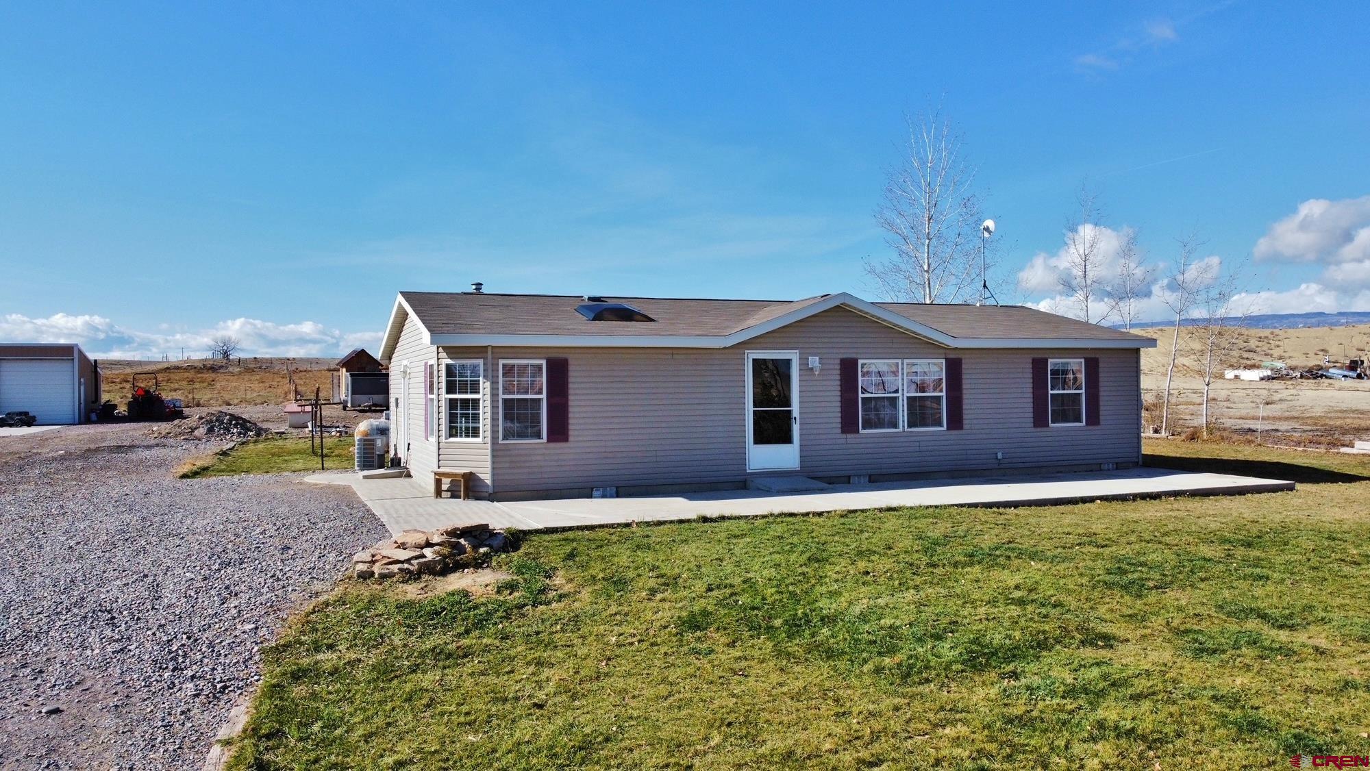 a house view with a garden space