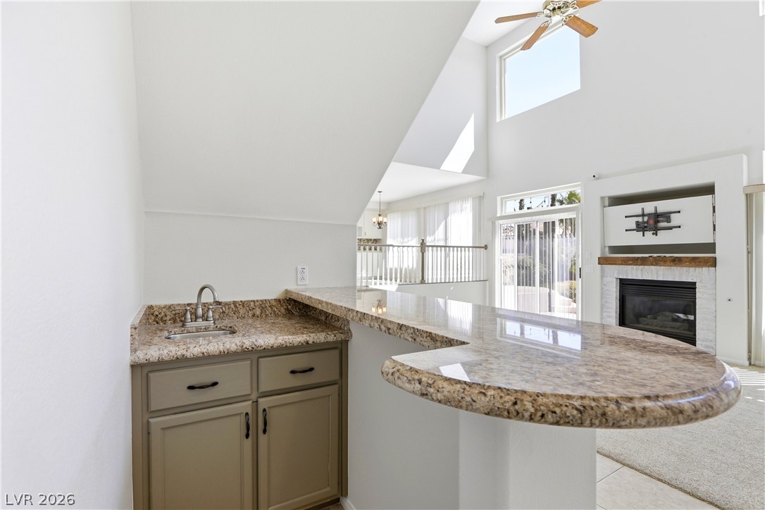 3692 River Canyon Road Las Vegas, NV 89129 - Photo 28 of 69 And a wet bar under the steps! Ready for entertaining.