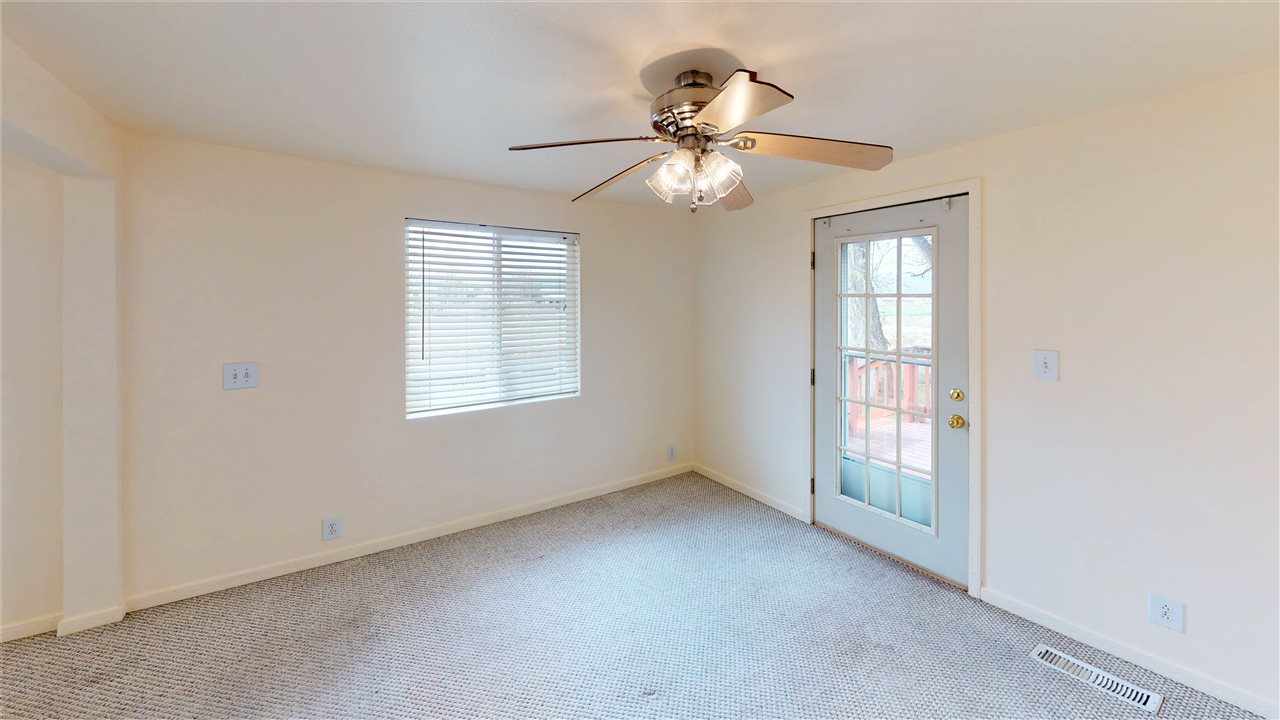 945 23 Road Grand Junction, CO 81505 - Photo 23 of 27 a view of an empty room with a window