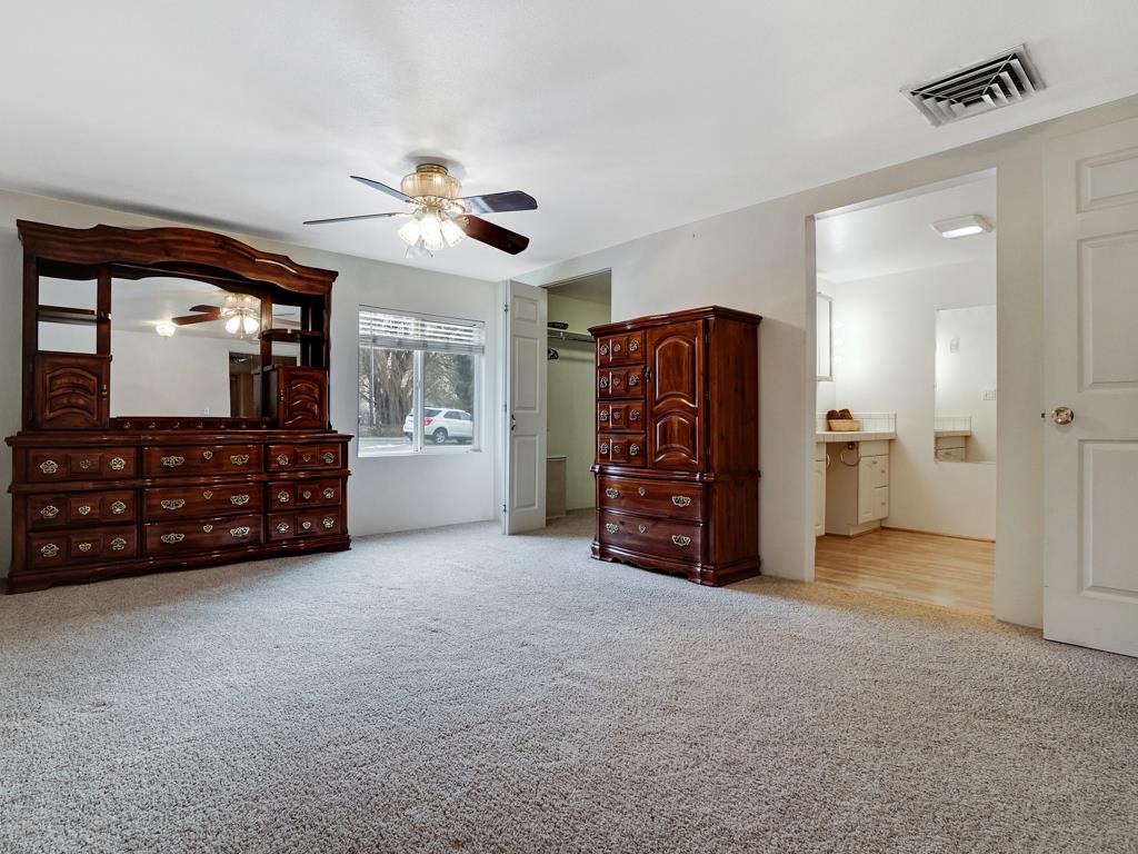 945 23 Road Grand Junction, CO 81505 - Photo 10 of 27 a view of a big room with closet and windows