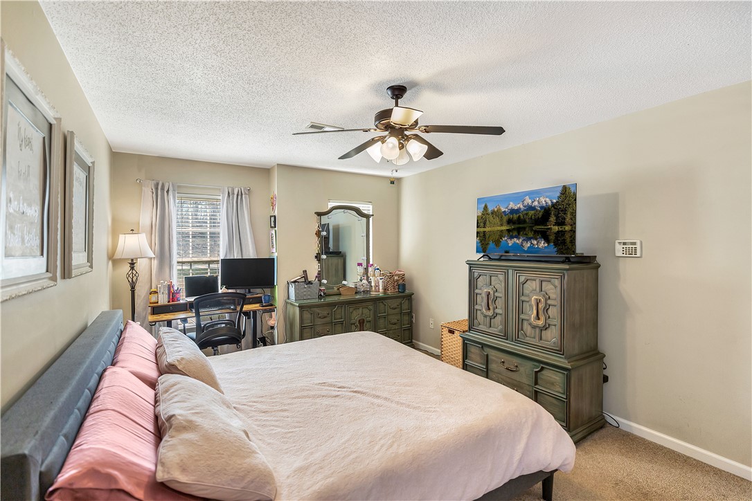 3338 Centerville Road Anderson, SC 29625 - Photo 14 of 28 This spacious room provides a comfortable retreat with ample space for rest and productivity.