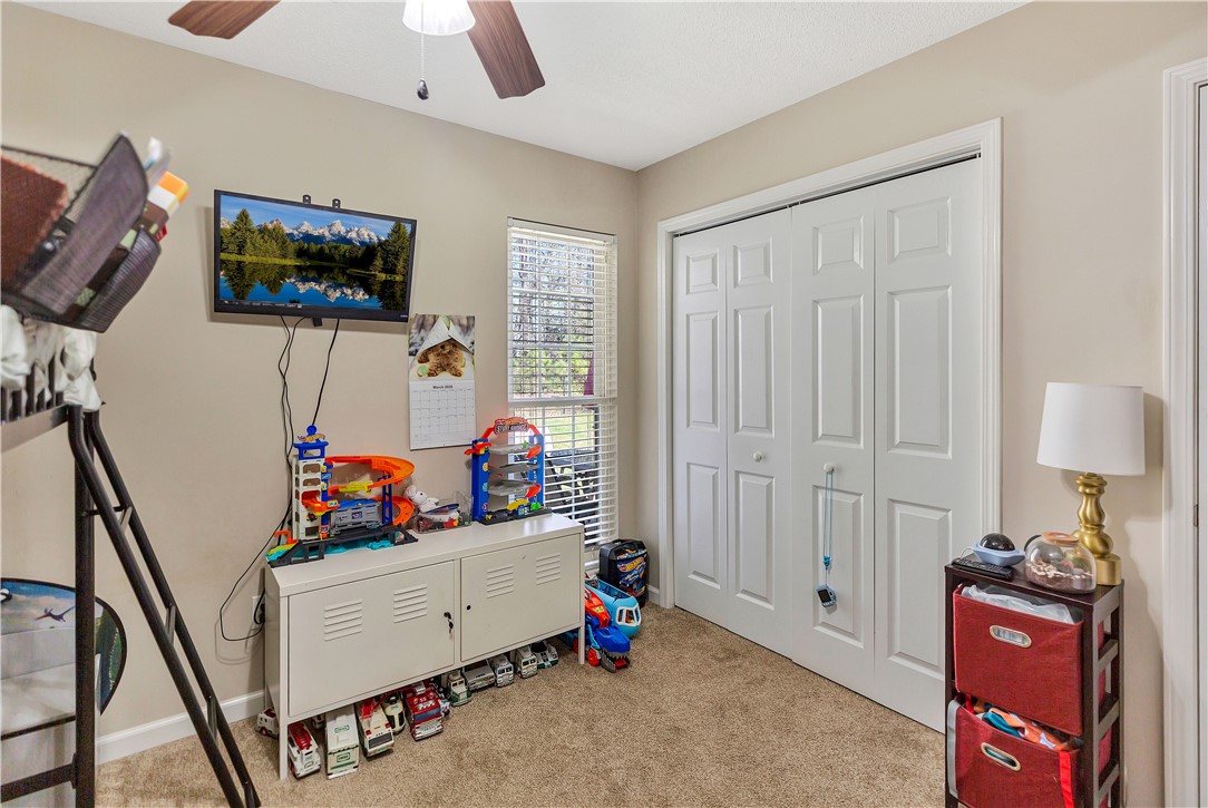3338 Centerville Road Anderson, SC 29625 - Photo 19 of 28 This cozy room offers comfortable carpeted flooring and practical closet space.
