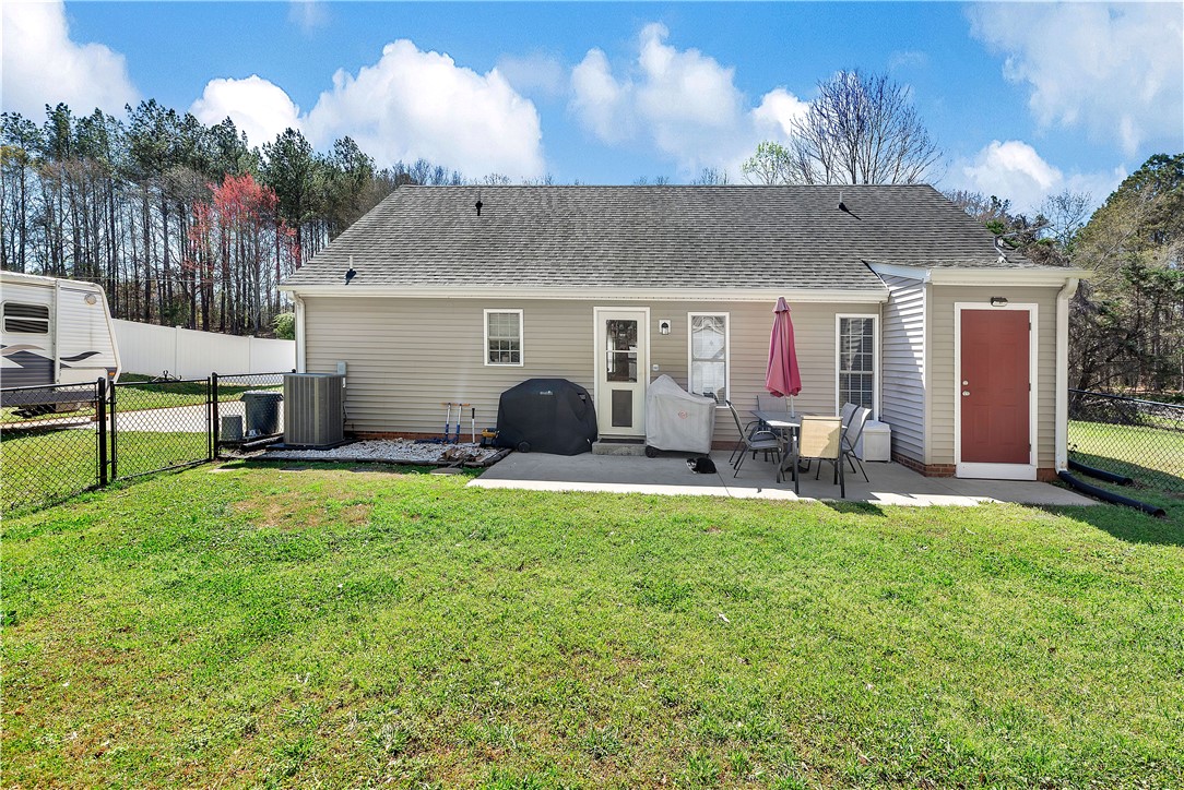 3338 Centerville Road Anderson, SC 29625 - Photo 23 of 28 This house features a charming patio perfect for outdoor enjoyment and gatherings.