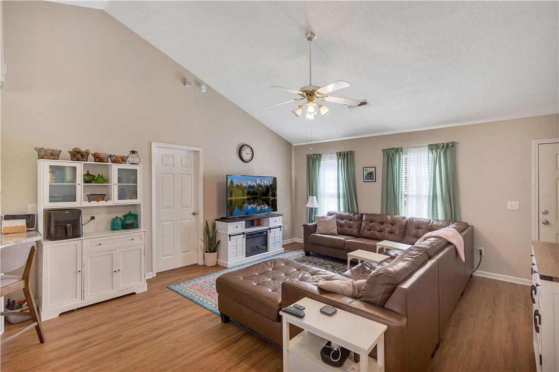 3338 Centerville Road Anderson, SC 29625 - Photo 5 of 28 This inviting living space features high ceilings and durable flooring, perfect for comfortable daily living.