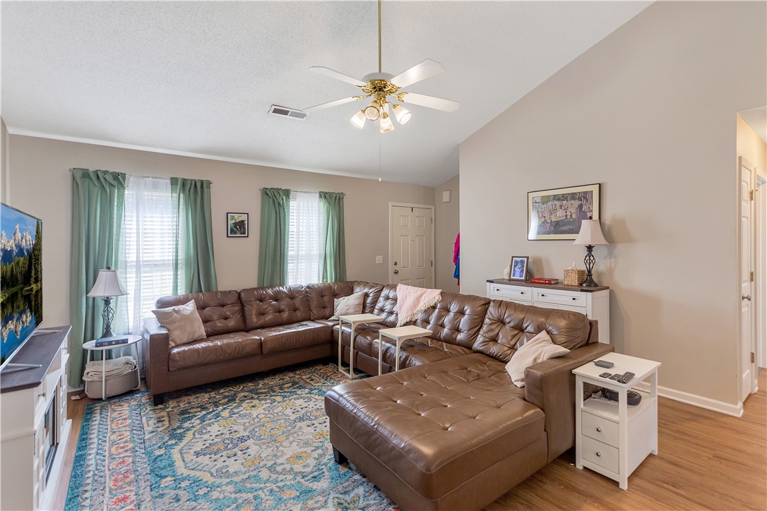 3338 Centerville Road Anderson, SC 29625 - Photo 6 of 28 This warm living space features ample seating and natural light.
