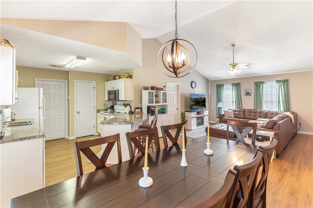 3338 Centerville Road Anderson, SC 29625 - Photo 8 of 28 This inviting space seamlessly combines a functional kitchen with a comfortable living area, perfect for daily life.