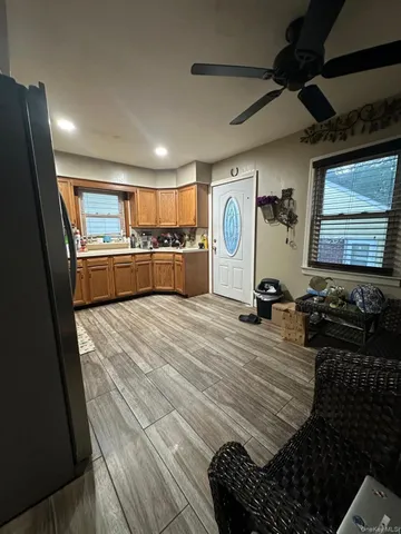 a room with lots of appliances and a window