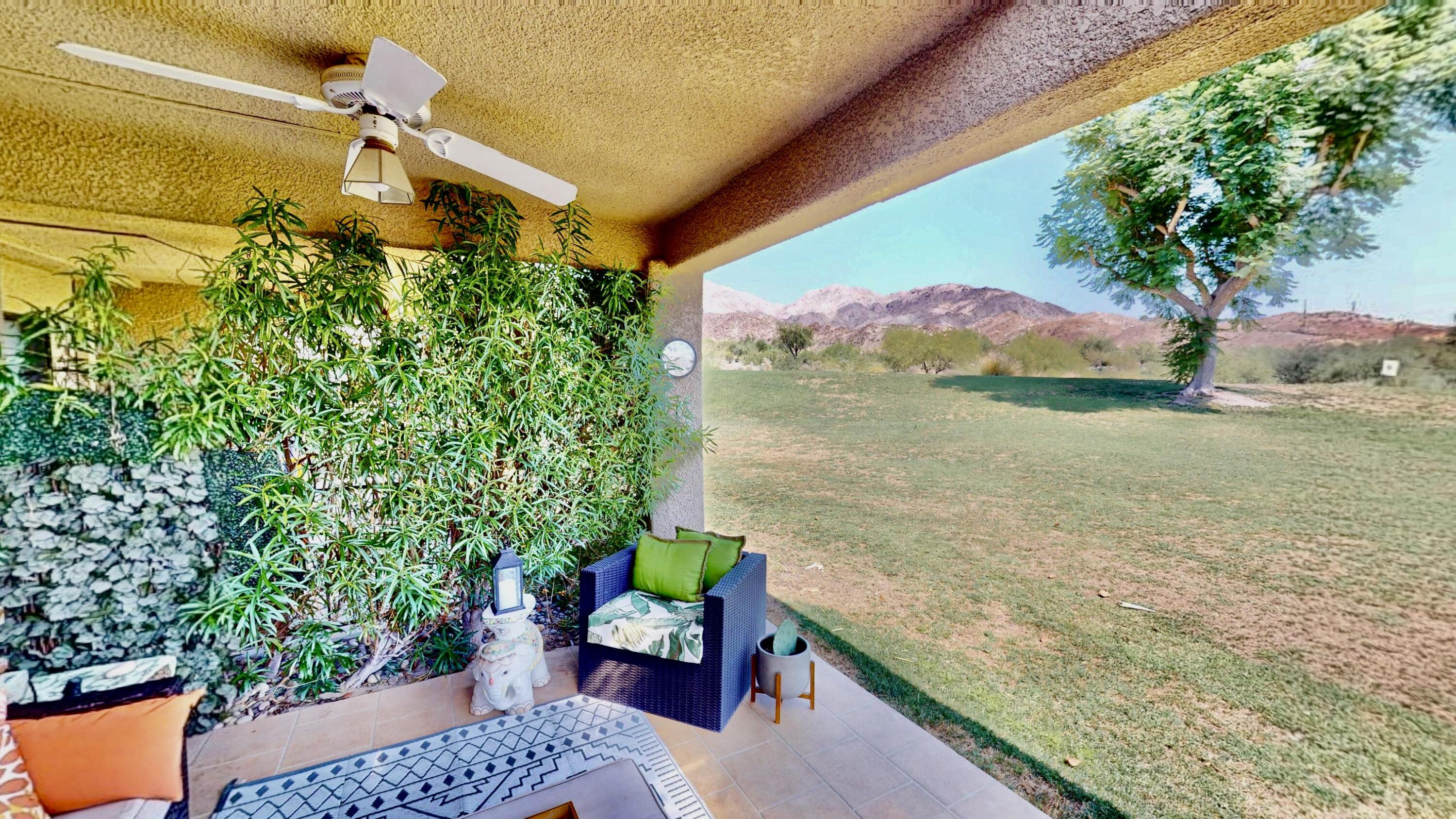 72350 Rim Drive Palm Desert, CA 92260 - Photo 23 of 30 a wooden floor with a lake view