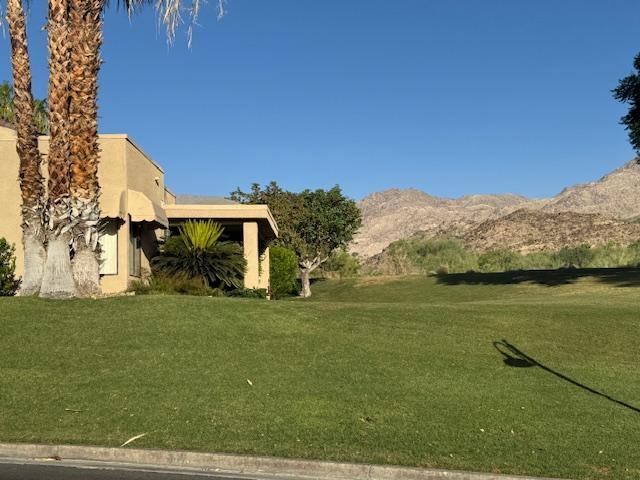 72350 Rim Drive Palm Desert, CA 92260 - Photo 24 of 30 a view of a house with a yard