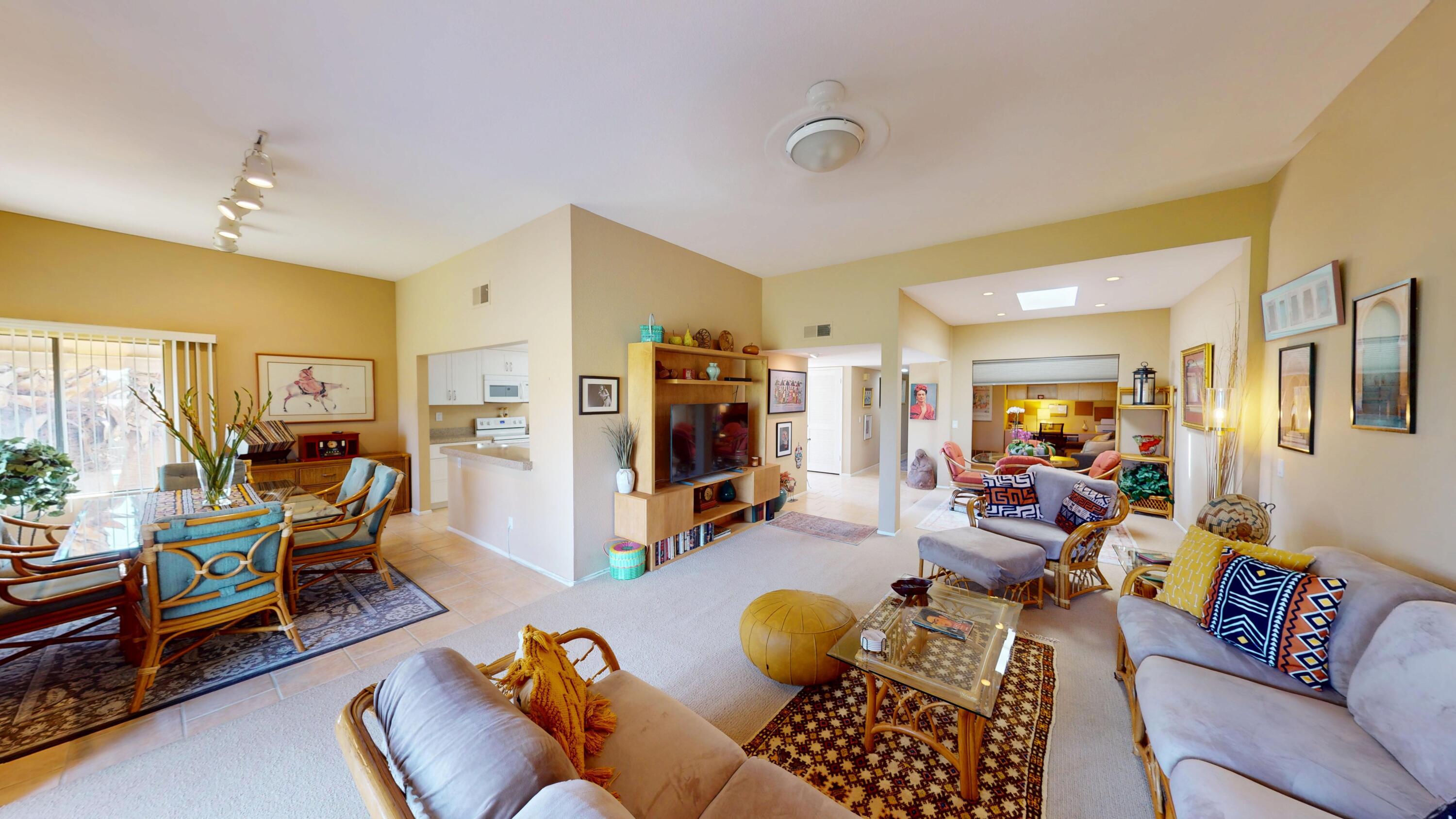 72350 Rim Drive Palm Desert, CA 92260 - Photo 6 of 30 a living room with furniture and a wooden floor