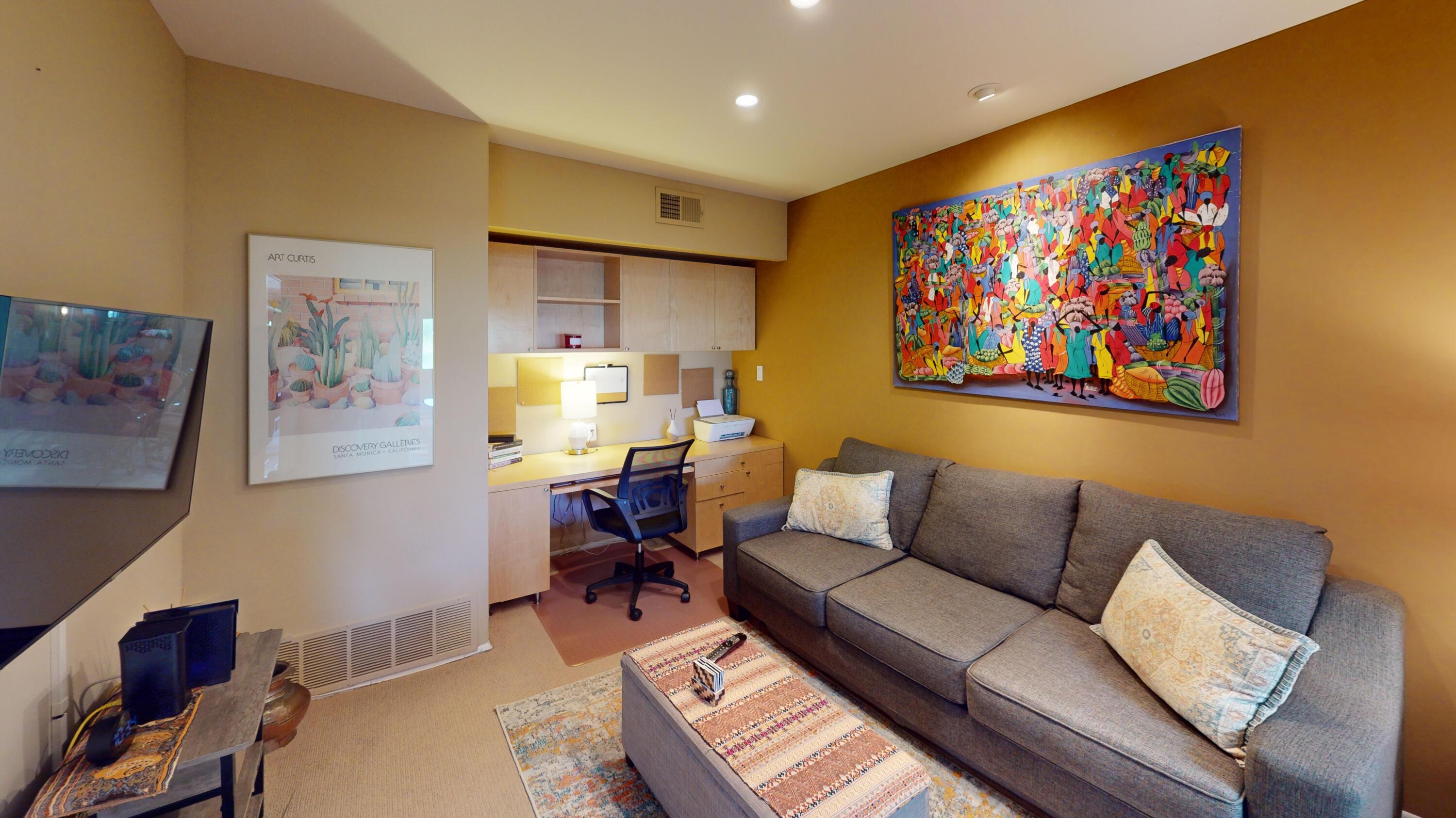 72350 Rim Drive Palm Desert, CA 92260 - Photo 9 of 30 a living room with furniture and a flat screen tv