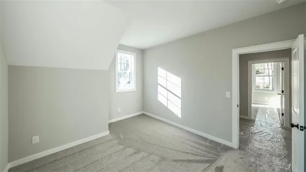 a view of an empty room with window