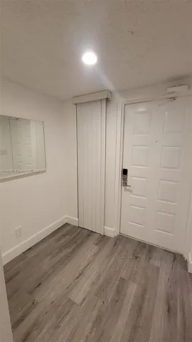 a view of storage and utility room with washer and dryer
