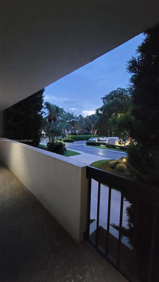 6562 Boca Del Mar Drive, Unit 225 Boca Raton, FL 33433 - Photo 5 of 24 a view of swimming pool from a balcony