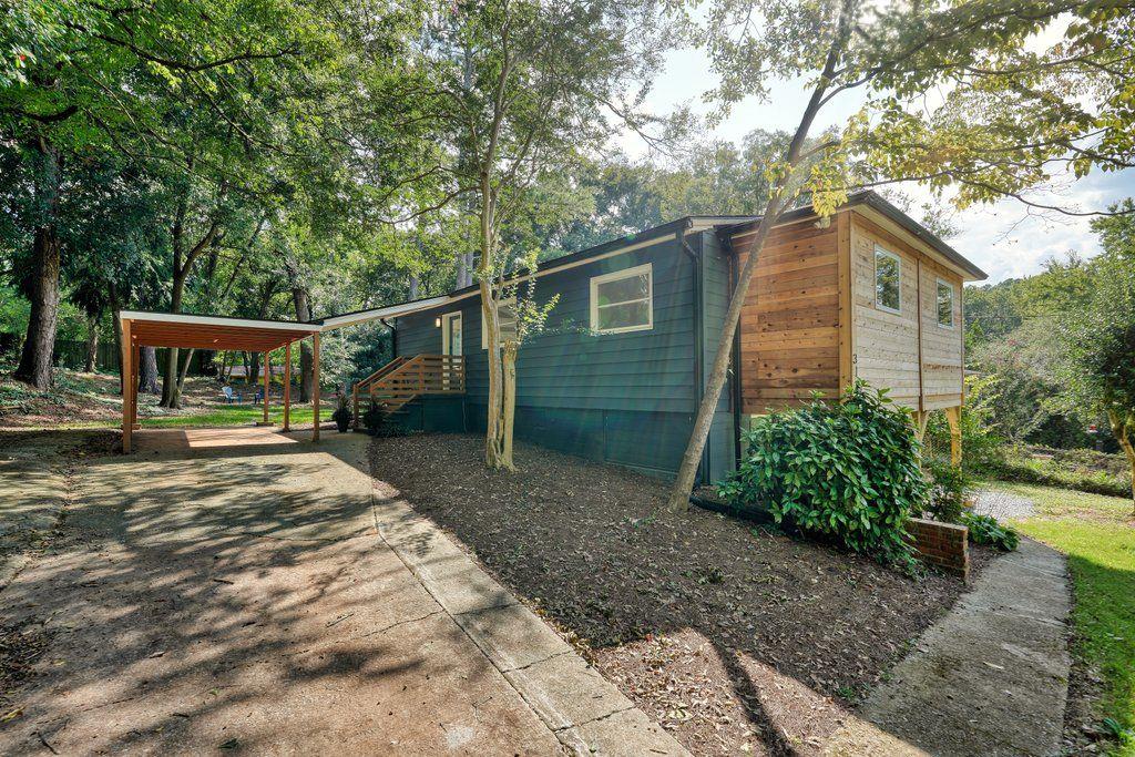 a house view with a backyard space