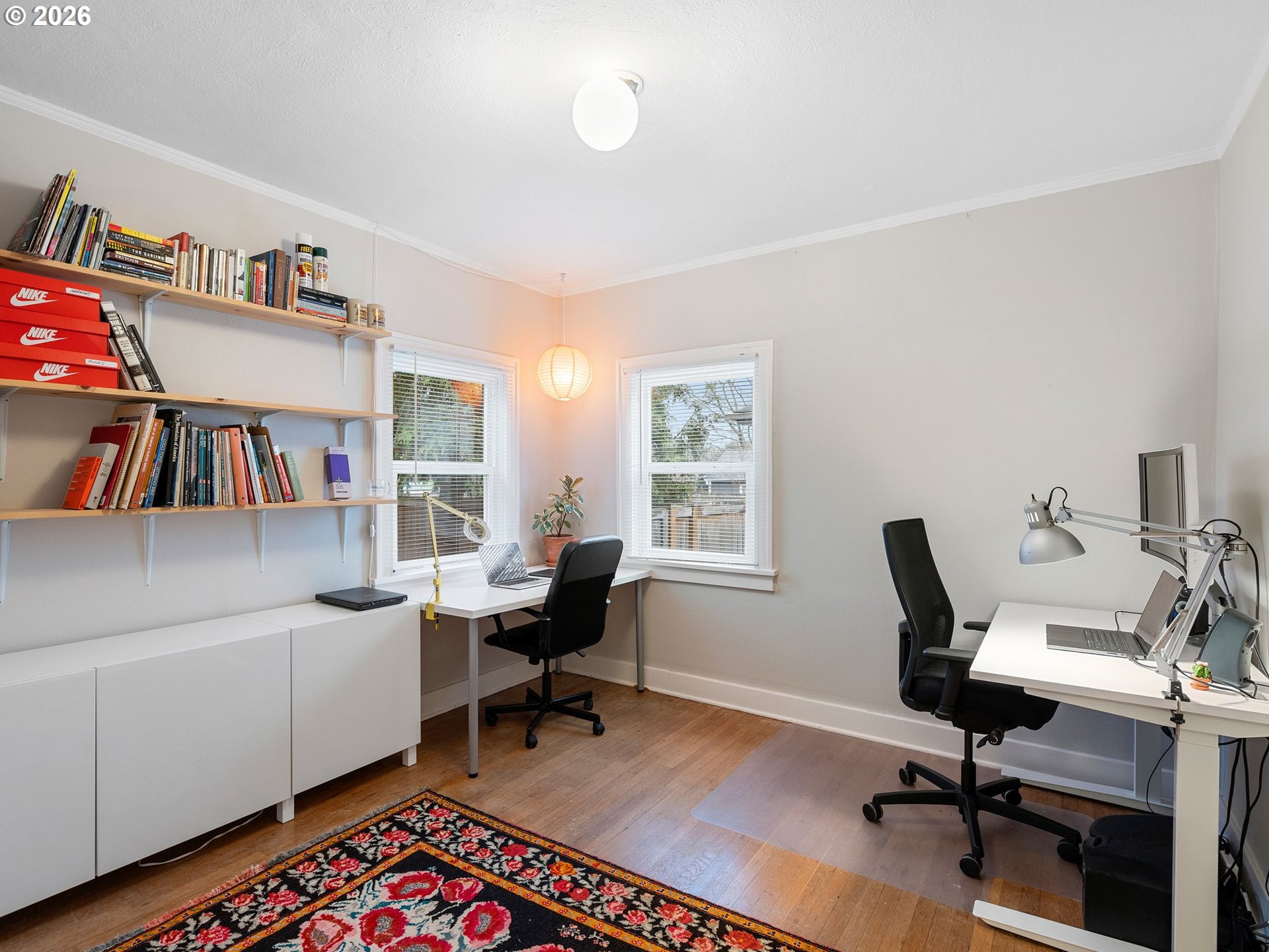 1310 Northeast 70th Avenue Portland, OR 97213 - Photo 15 of 30 a view of a workspace with a window and lounge chair