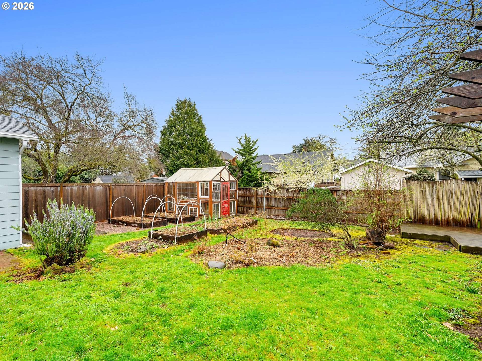 1310 Northeast 70th Avenue Portland, OR 97213 - Photo 23 of 30 a view of a house with backyard sitting area and garden