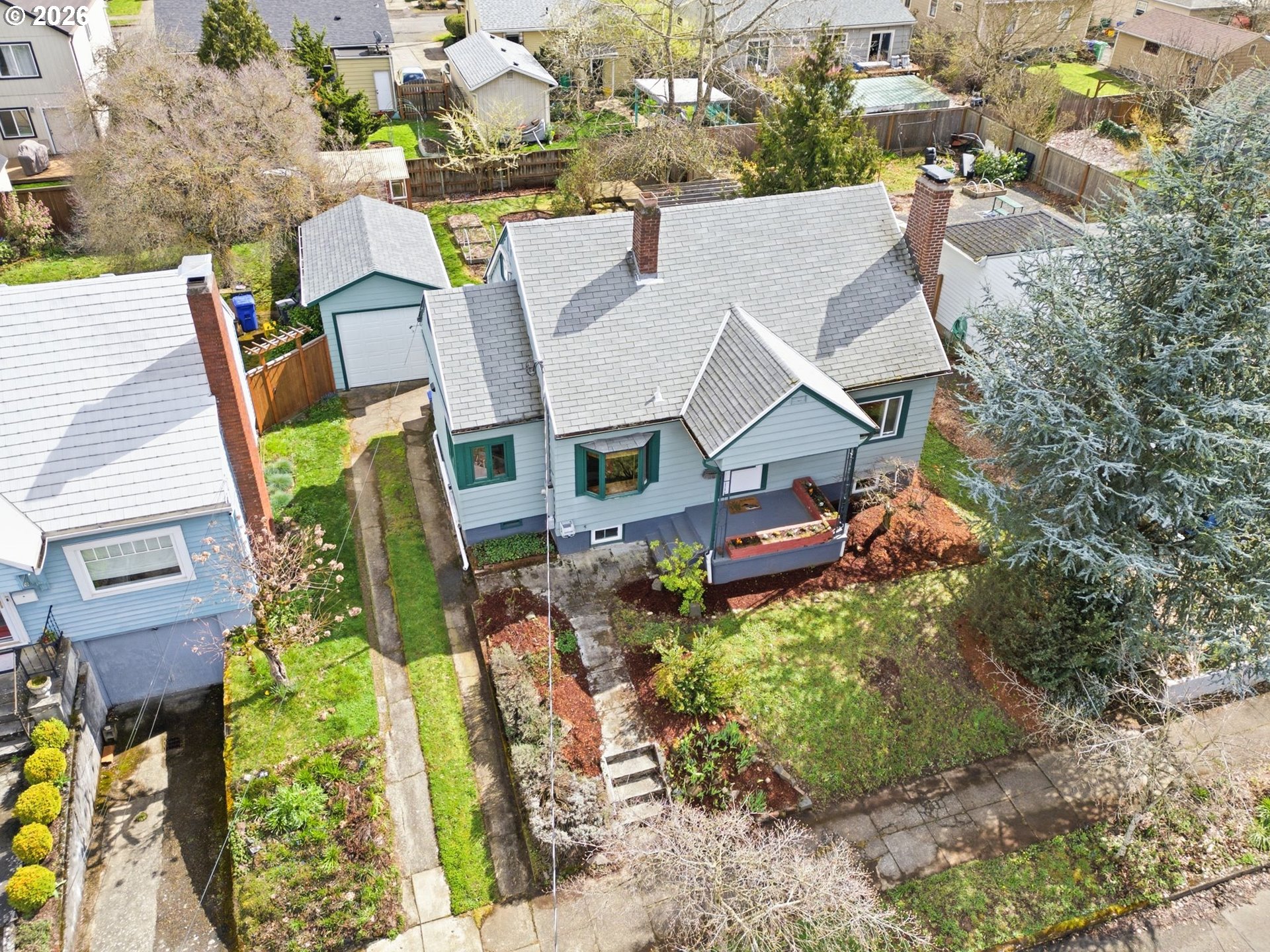 1310 Northeast 70th Avenue Portland, OR 97213 - Photo 27 of 30 an aerial view of a house with a yard basket ball court and outdoor seating