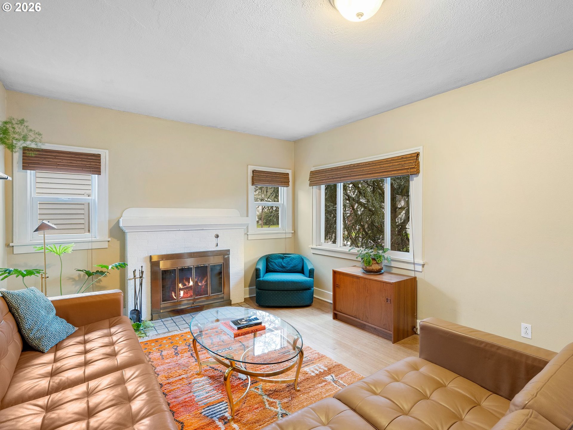 1310 Northeast 70th Avenue Portland, OR 97213 - Photo 5 of 30 a living room with furniture and a fireplace