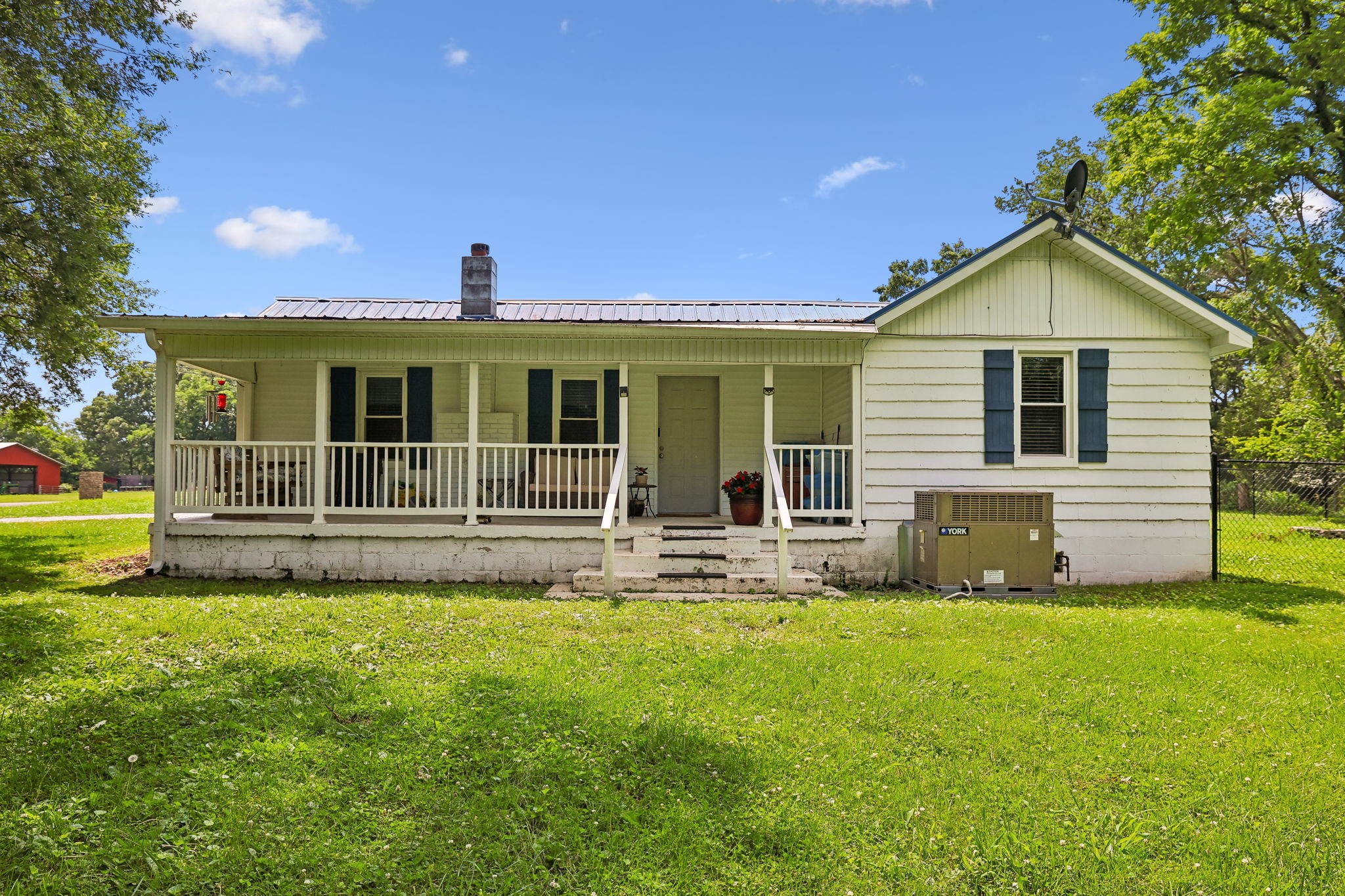 1466 Bible Crossing Road Winchester, TN 37398 - Photo 6 of 42 a view of a house with a yard and sitting area