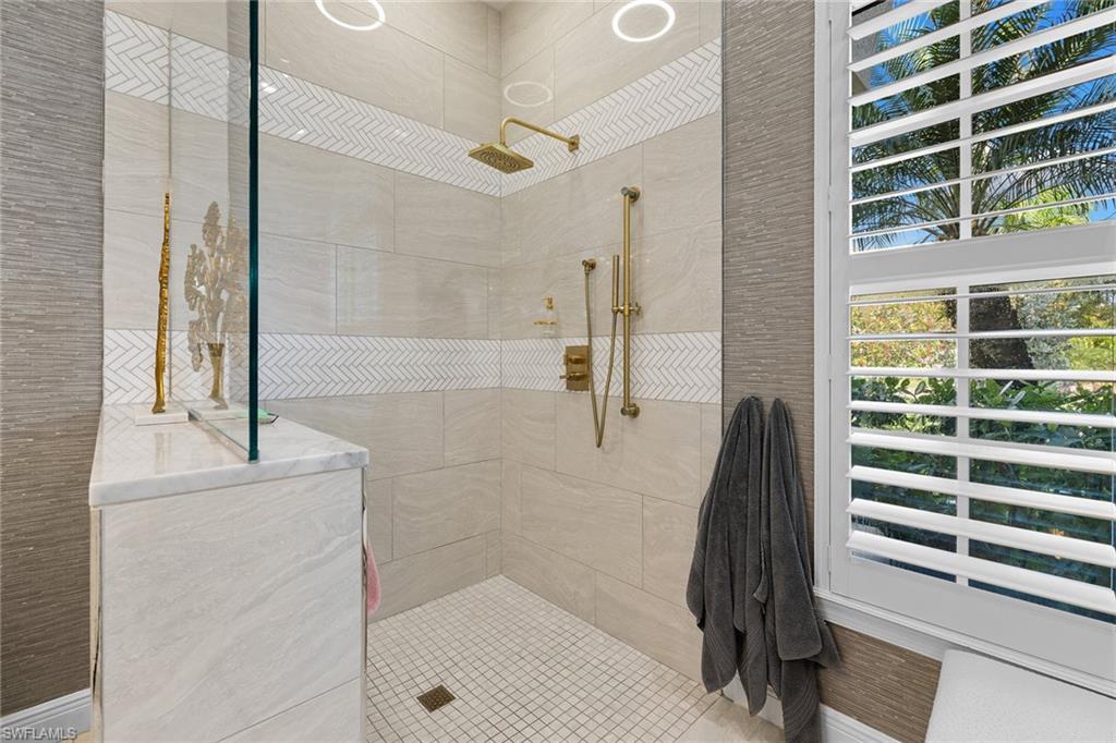 7837 Classics Drive Naples, FL 34113 - Photo 37 of 50 Bathroom with a walk in shower