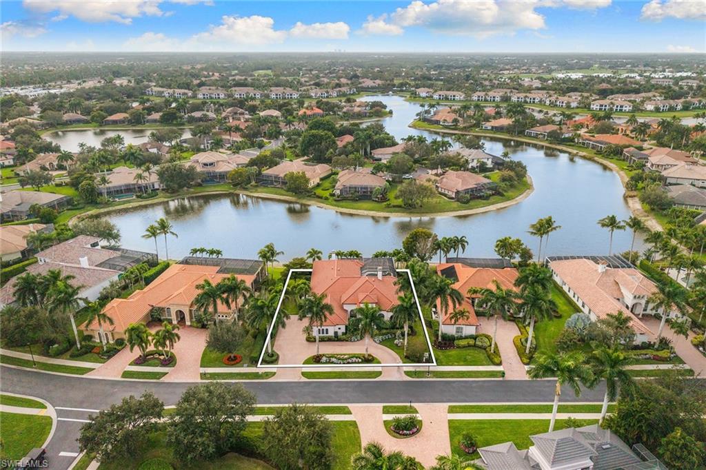 7837 Classics Drive Naples, FL 34113 - Photo 46 of 50 Aerial view of residential area featuring a large body of water