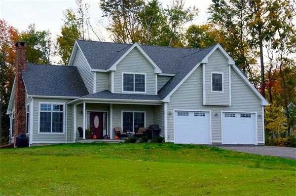 69 Carpenter Road Monson, MA 01057 - Photo 1 of 16 front view of a house with a yard