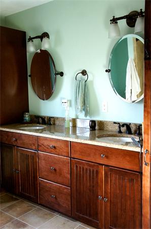 69 Carpenter Road Monson, MA 01057 - Photo 11 of 16 a bathroom with a sink and a mirror
