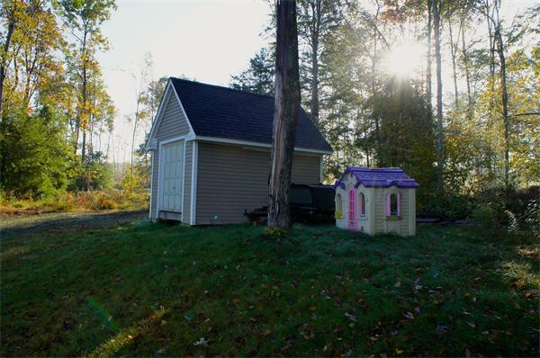 69 Carpenter Road Monson, MA 01057 - Photo 15 of 16 a house view with a garden space