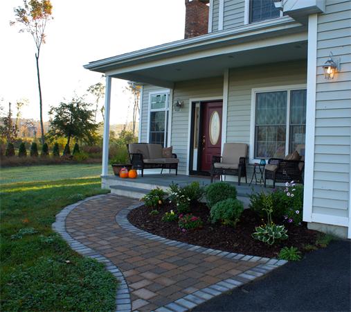 69 Carpenter Road Monson, MA 01057 - Photo 2 of 16 a view of a house with backyard porch and garden