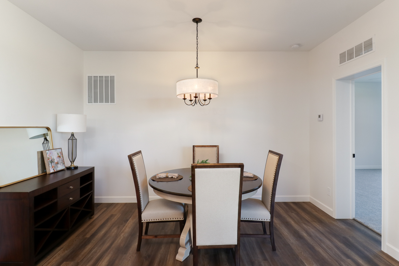 1332 Monterey Pine Drive Normal, IL 61761 - Photo 13 of 33 a view of a dining room with furniture window and wooden floor