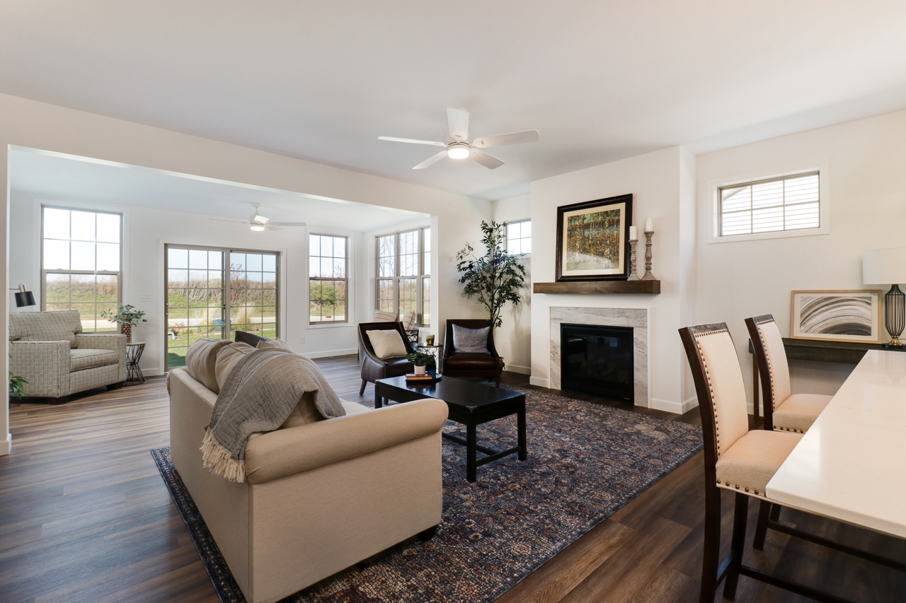 1332 Monterey Pine Drive Normal, IL 61761 - Photo 15 of 33 a living room with furniture fireplace and a table