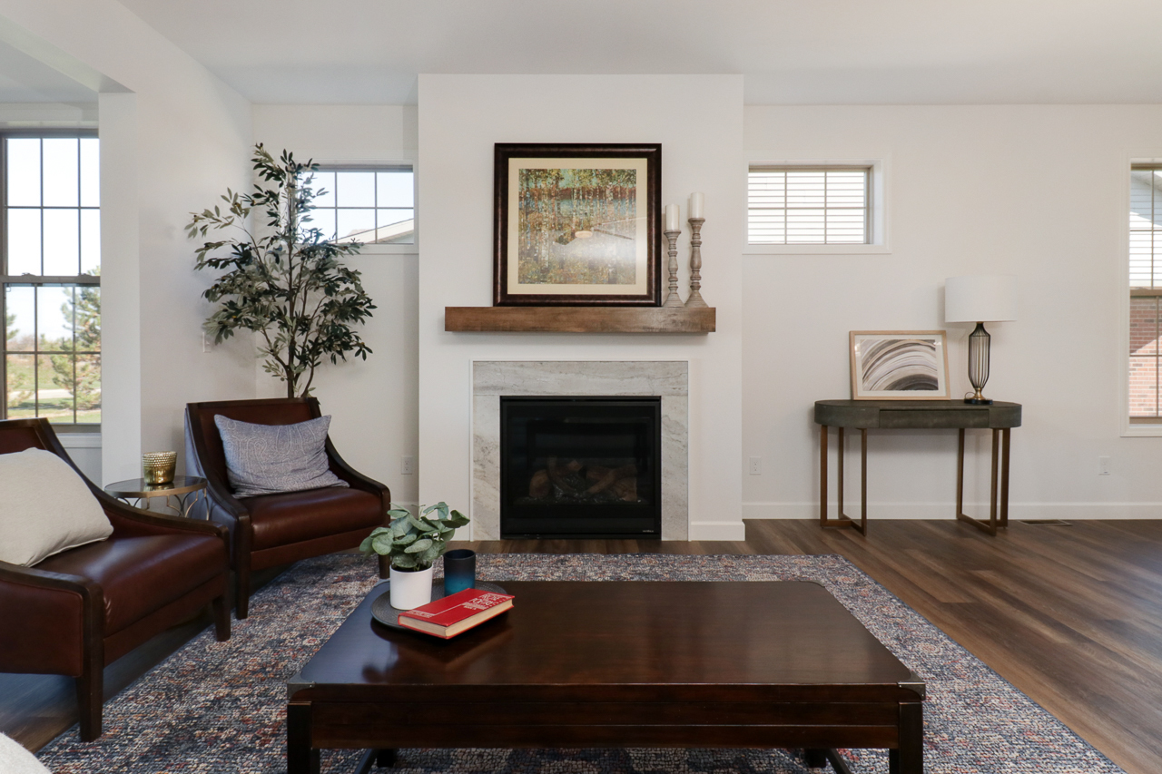1332 Monterey Pine Drive Normal, IL 61761 - Photo 16 of 33 a living room with furniture and a fireplace